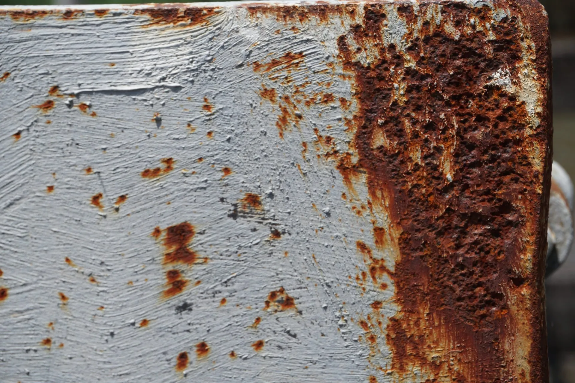 Pitting corrosion spots on a stainless steel surface